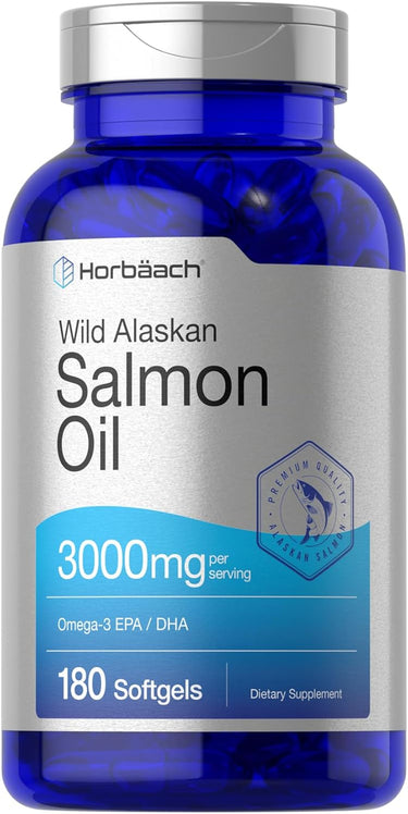 Blue supplement bottle labeled 'Wild Alaskan Salmon Oil' by Horbaach with a silver cap.