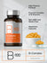 B-100 B-Complex supplement bottle with features listed on a gray background