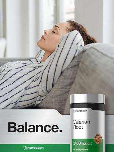 View 6 Woman relaxing on a couch with a bottle of Horbaach Valerian Root, suggesting tranquility and calmness.