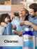Family sitting together with a bottle of Oxy-Tone Intestinal Cleanser in the foreground.