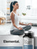 Woman meditating with a bottle of Elemental Triple Magnesium Complex supplement in the foreground.