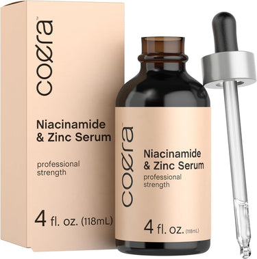 Cohera Niacinamide & Zinc Serum bottle with dropper and packaging on a white background