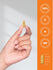 Hand holding a supplement capsule with product details on an orange background