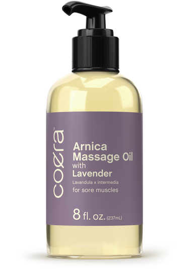 Coera Arnica Massage Oil with Lavender bottle on a white background