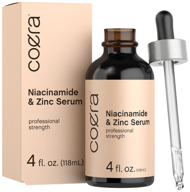 Coera Niacinamide & Zinc Serum bottle with dropper and packaging on a white background