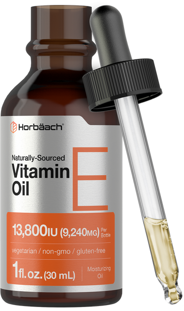 View 1 Vitamin E oil bottle with dropper labeled 'Horbaach' on a white background