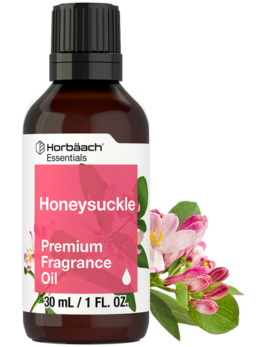 Bottle of Honeysuckle premium fragrance oil with floral design on label