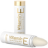 Two Vitamin E moisturizing sticks with gold accents on a white background