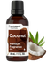 Bottle of Horbaach Coconut Premium Fragrance Oil with coconut and leaves on a white background