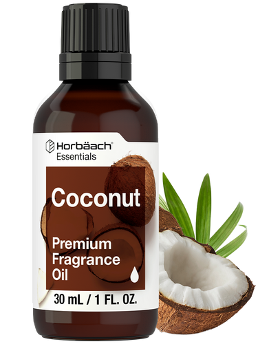 Bottle of Horbaach Coconut Premium Fragrance Oil with coconut and leaves on a white background