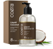 Coera Liquid Coconut Oil bottle and packaging with a coconut and leaves on a white background