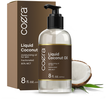 View 1 Coera Liquid Coconut Oil bottle and packaging with a coconut and leaves on a white background