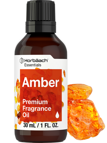 Bottle of Amber premium fragrance oil with a white label on a white background