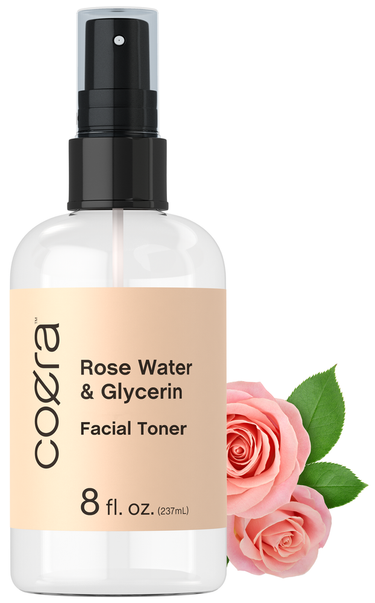 View 1 Coora Rose Water & Glycerin Facial Toner bottle with a pink rose and green leaves on a white background