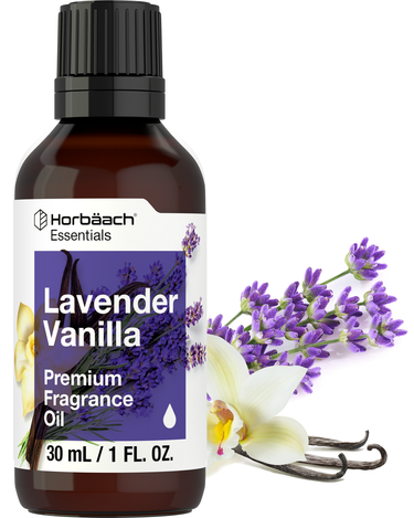 Bottle of Lavender Vanilla fragrance oil with lavender flowers and vanilla beans on a white background