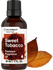 Bottle of Horbaach Sweet Tobacco fragrance oil with leaves on a white background