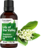 Horbaach Lily of the Valley fragrance oil bottle with flowers and leaves on a white background