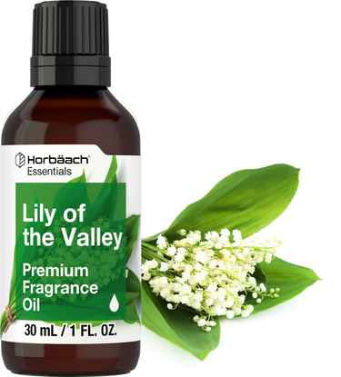 Horbaach Lily of the Valley fragrance oil bottle with flowers and leaves on a white background