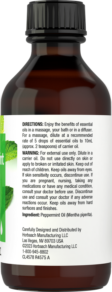 Brown glass bottle with black cap and white label on a white background