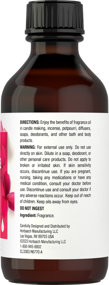 View 2 Bottle of fragrance oil with label and directions on a white background