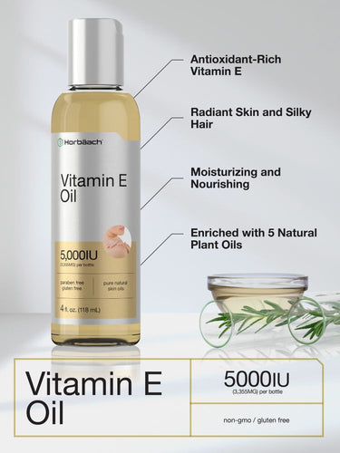 View 3 Bottle of vitamin E oil with text highlighting its benefits and ingredients.