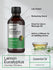Bottle of Lemon Eucalyptus essential oil with usage instructions on a light gray background