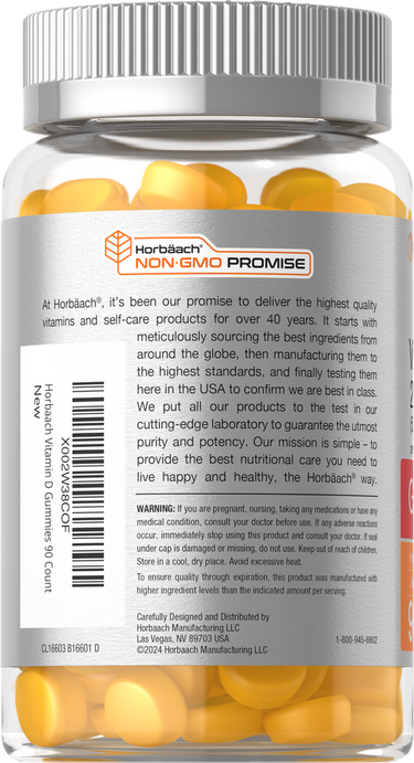 View 3 Vitamin supplement bottle with yellow capsules and silver cap on a white background