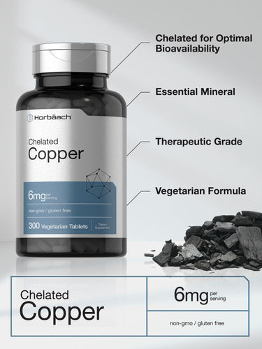 Bottle of chelated copper supplement with label details and black rock-like substance.