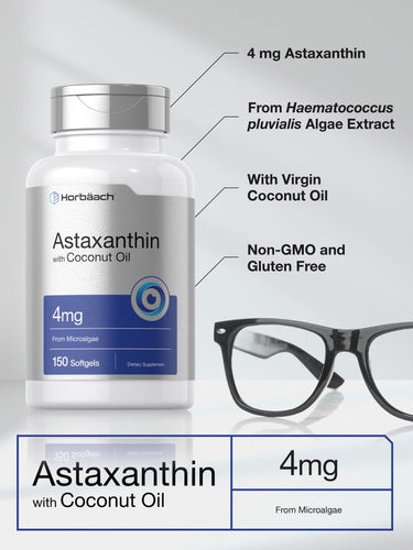 Astaxanthin supplement bottle with label details and a pair of glasses on a light gray background