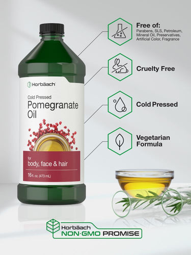 Bottle of pomegranate oil with label and product features on a white background