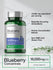 view 5 Green bottle of blueberry concentrate capsules with text highlighting benefits.