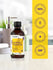 Bottle of lavender chamomile fragrance oil with certification logos on a yellow background.