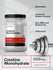 view 4 Creatine Monohydrate powder container with fitness equipment on a light gray background