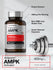 Supplement bottle labeled 'Actiponin AMPK Activator' with gym weight in background.