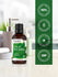 Bottle of Lily of the Valley premium fragrance oil with branding and quality assurance logos on a blurred background.