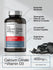 Bottle of Calcium Citrate + Vitamin D3 supplement with labeled features on a gray background