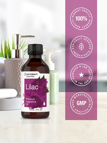 Bottle of lilac fragrance oil with purple packaging and branding elements.