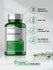 Green bottle of chlorophyll capsules with certification icons on a light background.