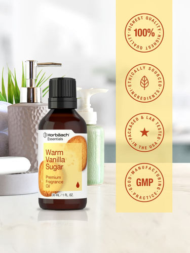 View 5 Bottle of warm vanilla sugar fragrance oil with certification badges on a blurred background.