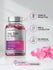 Bottle of Hair, Skin & Nails supplement with pink capsules and product features on a light background.