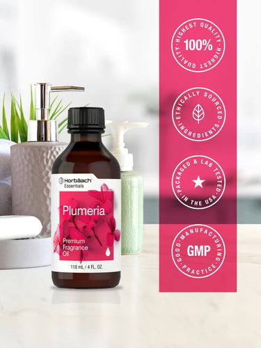 View 5 Plumeria premium fragrance oil bottle with pink label on a white surface, featuring Harbath Essentials branding.
