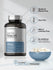 Niacin supplement bottle with a bowl of capsules on a light gray background