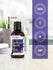 Bottle of lavender vanilla fragrance oil with certification logos on a white background.