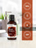 Bottle of Harbord Sweet Tobacco perfume with certification logos on a blurred background