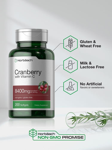 View 5 Green bottle of cranberry supplement with label details on a light background.