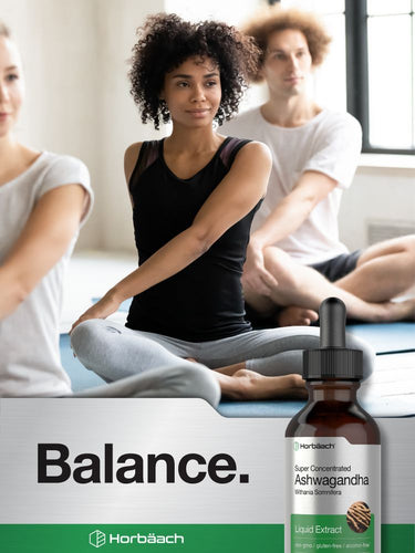People practicing yoga with a bottle of Horbaach Ashwagandha supplement in the foreground.