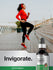 view 6 Person running on a bridge with a bottle of Horbaach Cayenne Liquid Extract in the foreground.