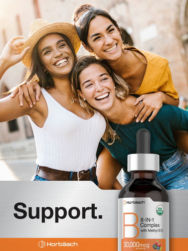 View 6 Three young women laugh and embrace, holding a B-Complex Liquid 8-in-1 bottle.