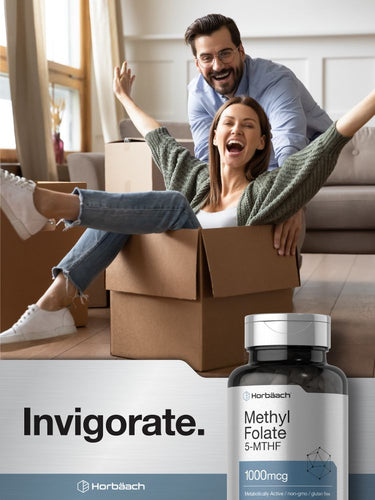 View 6 Couple playing with moving box in a living room, Methyl Folate supplement bottle visible.