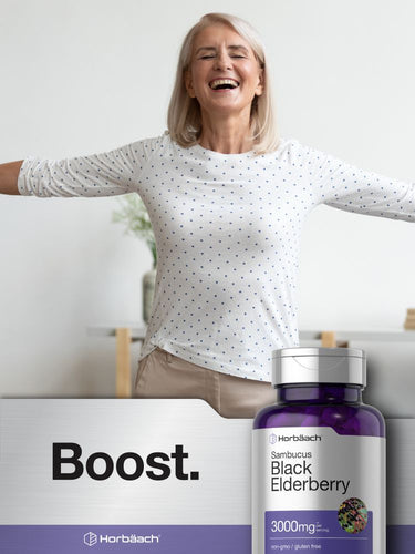 Woman smiling with arms outstretched, bottle of Black Elderberry supplement in foreground.
